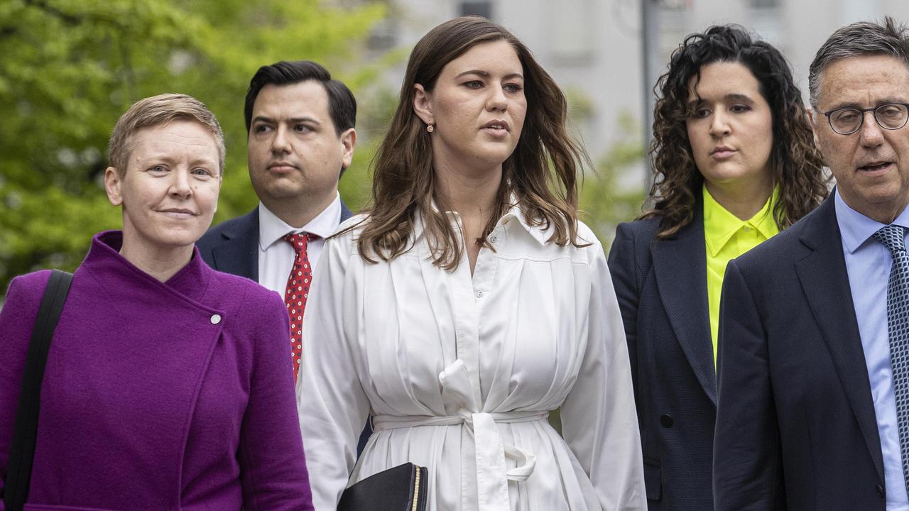 Brittany Higgins walking to court on day four of the trial with ACT Victims of Crime Commissioner Heidi Yates (left). Picture: NCA NewsWire / Gary Ramage