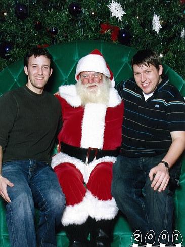 2007 ... A larger chair finally allowed both brothers to sit next to Santa. Picture: Martin Gray