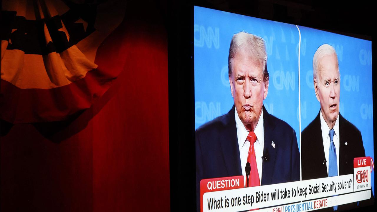 LOS ANGELES, CALIFORNIA - JUNE 27: The CNN presidential debate between U.S. President Joe Biden and Republican presidential candidate former President Donald Trump is shown at a watch party at The Continental Club on June 27, 2024 in Los Angeles, California. Biden and Trump are facing off in the first presidential debate of the 2024 presidential cycle.   Mario Tama/Getty Images/AFP (Photo by MARIO TAMA / GETTY IMAGES NORTH AMERICA / Getty Images via AFP)