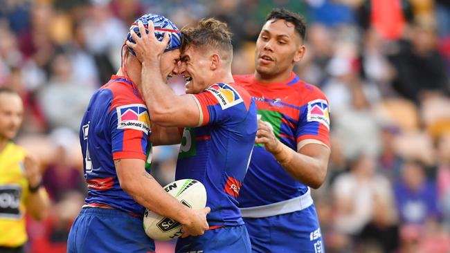 Kalyn Ponga celebrates scoring a try with his Knights teammates. Picture: AAP