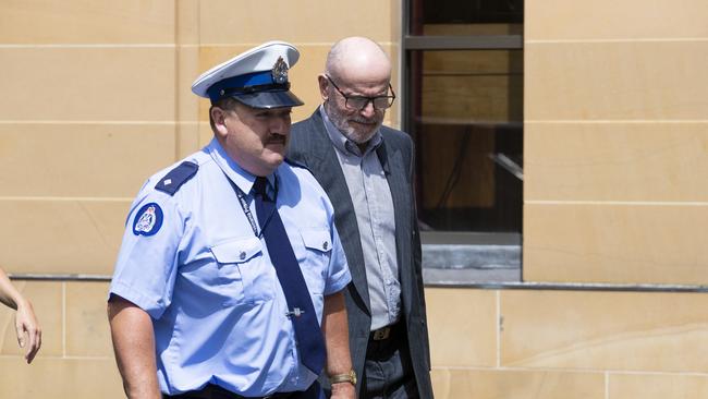 Convicted sex offender Darrel George Harington leaves the Supreme Court in Hobart.