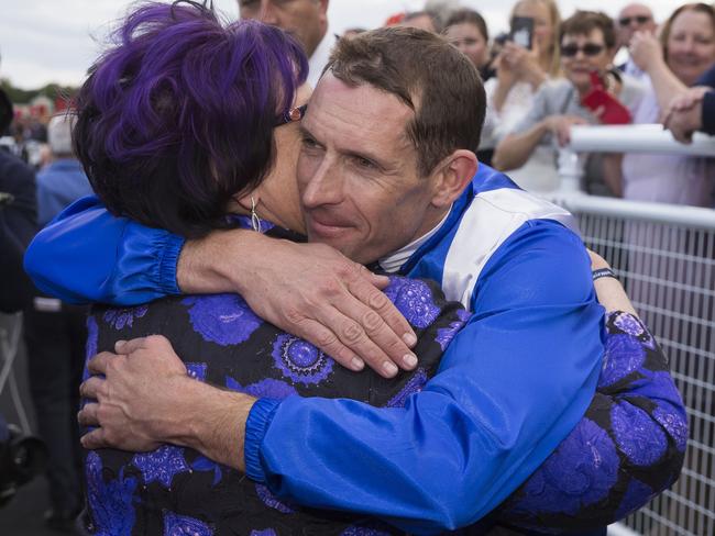 We’ve done it again: Hugh Bowman hugs part-owner Debbie Kepitis. Picture: AAP