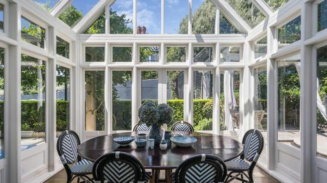 Formal dining with glass walls to see out to the views.