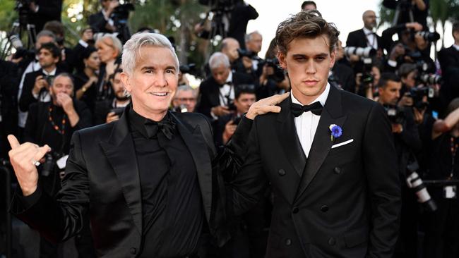 Baz Luhrmann (L) and US actor Austin Butler who plays Elvis.