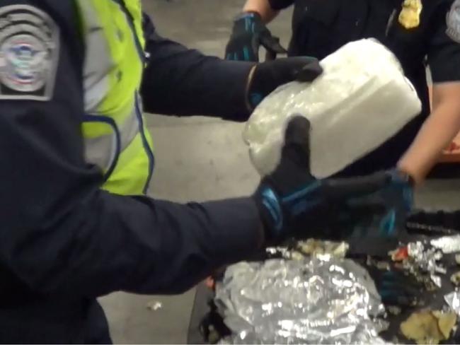 Still image from Australian Federal Police video of the seizure in the USA of 1.7 tonnes of methylamphetamine disguised as audio equipment – the largest-ever seizure of meth bound for Australia, and the largest-ever domestic seizure of the drug in the US. The seizure could have resulted in more than 17 million drug deals, with an estimated street value of approximately AUD $1.29 billion. Officers from the Australian Federal Police and Victoria Police yesterday arrested six people in Victoria and NSW allegedly involved with the US-based organised crime syndicate being investigated for the shipment. Source: Supplied by the AFP