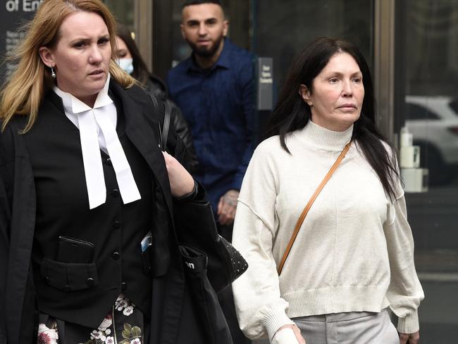 Roberta Williams (right) in her more familiar surroundings, leaving the County Court. Picture: Andrew Henshaw