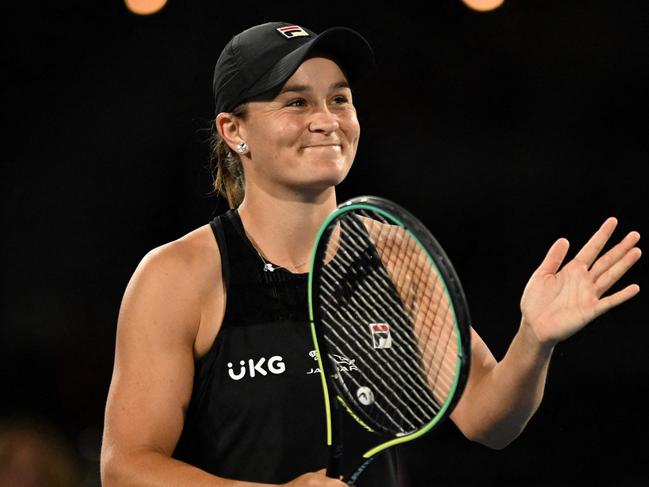 Ashleigh Barty of Australia celebrates her win against Iga Swiatek of Poland after their women's singles semi-final match on day 7 of the WTA Adelaide International tennis tournament in Adelaide on January 8, 2022. (Photo by Michael Errey / AFP) / -- IMAGE RESTRICTED TO EDITORIAL USE - STRICTLY NO COMMERCIAL USE --