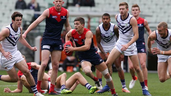 AFL Round 14. 22/06/2019. Melbourne v Fremantle at the MCG. Melbourne's Jay Lockhart breaks from the stoppage 1st quarter . Pic: Michael Klein