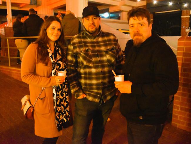 Kathryn, Bryce and Fred at the Whisky, Wine and Fire Festival 2024 at the Caulfield Racecourse. Picture: Jack Colantuono