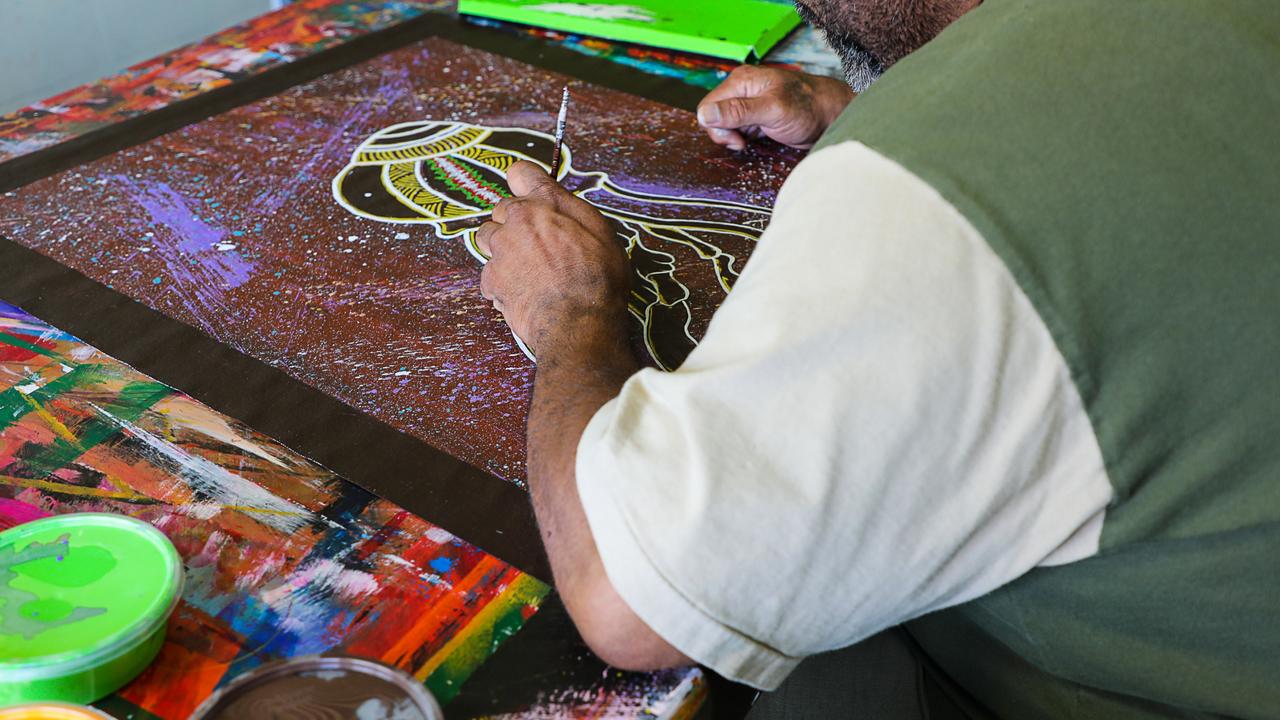 A First Nations prisoner completing artwork at the prison.