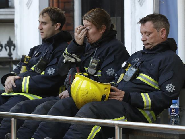 Two hundred firefighters tackled the massive blaze with reports desperate residents had to build ropes from sheets to escape the inferno. Picture: AP