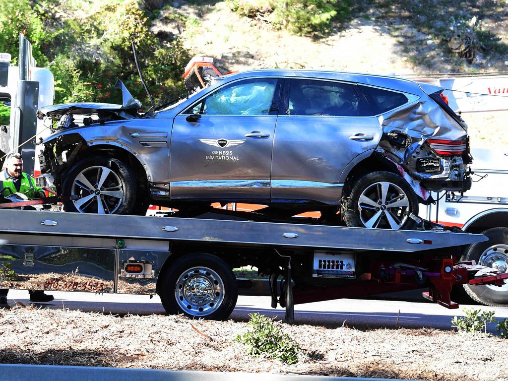 A tow truck recovers the vehicle driven by golfer Tiger Woods. AFP