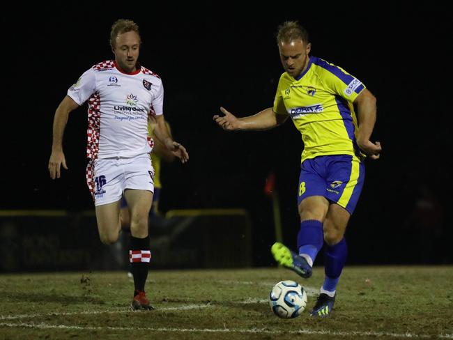 Gold Coast United midfielder Justyn McKay (right) in action against the Gold Coast Knights in the 2019 NPL Queensland football competition. Picture: Craig Clifford