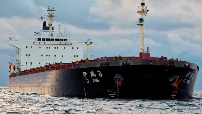 The Yi Peng 3 is anchored and being monitored by a Danish naval patrol vessel in the sea of Kattegat, near the City og Granaa in Jutland, Denmark. Picture; AFP.