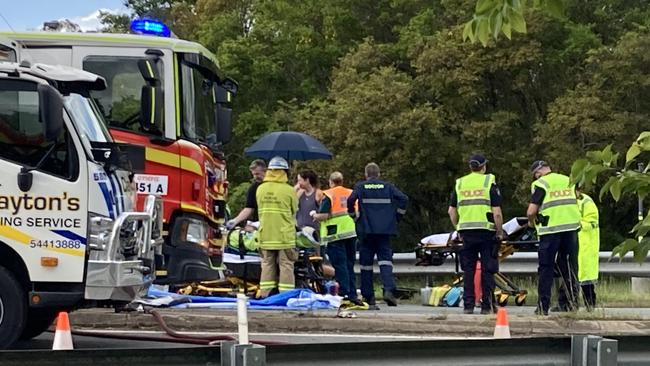 Fireys worked for more than 30 minutes to free the driver, who was then flown to the Royal Brisbane and Women's’ Hospital in a serious condition.