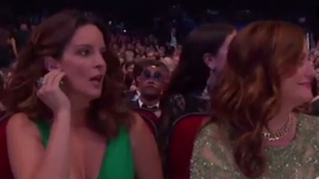 Tina Fey comments to Amy Poehler after hearing the Bill Cosby announcement at the 2016 Emmys.