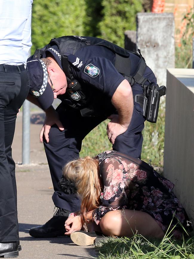 People leaving the Melbourne Cup Day at Eagle Farm. Picture: AAP/Richard Gosling