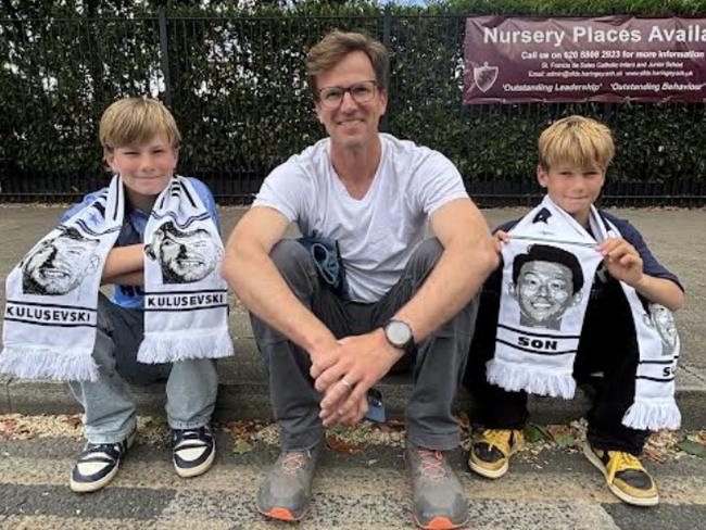 Tottenham Hotspur fans Sam Fitz, 45, from the US, with his two sons Lukas, 11, (left) and Tal, 11 at the team’s final match of the English Premier League season. Picture: Sophie Elsworth