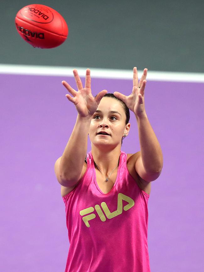 Barty warms up with the Sherrin in Shenzhen. Picture: Lintao Zhang/Getty