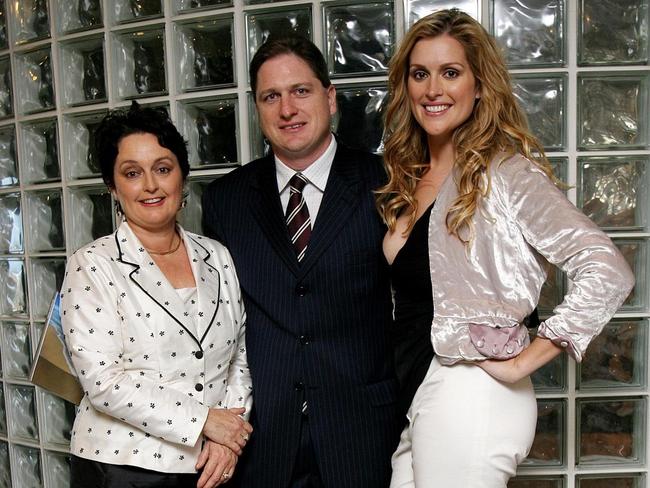 Glamorous Kate Fischer at a function with her mother Pru Goward and Austrade chief economist Tim Harcourt.