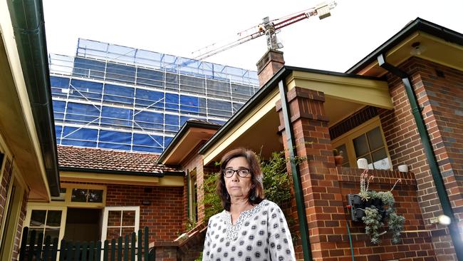 Construction zone: Llew Kennedy’s historic home in Rosebank Avenue is next to a line of new apartment blocks being built on Cliff Road in Epping. (AAP IMAGE / Troy Snook)