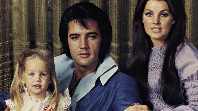 Elvis Presley, wife Priscilla and daughter Lisa-Marie.