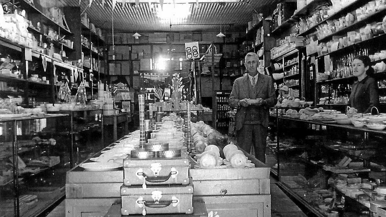 Frederick Avenell in his Avenell Bros shop, with Betty McWatters behind the counter. Picture: Contributed