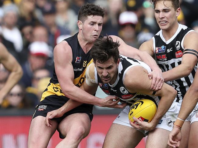 SANFL - GRAND FINAL  22/09/19 - Port Adelaide v Glenelg at Adelaide Oval. Sam Mayes under pressure from Bradley McCarthy Picture SARAH REED