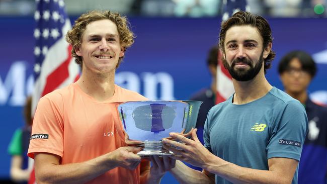 NEW YORK, NEW YORK - SEPTEMBER 07: Jordan Thompson (R) and Max Purcell (L) of Australia celebrates with their trophy after defeating Kevin Krawietz and Tim Puetz of Germany in their Men's Doubles Final match on Day Thirteen of the 2024 US Open at USTA Billie Jean King National Tennis Center on September 07, 2024 in the Flushing neighborhood of the Queens borough of New York City. (Photo by Al Bello/Getty Images)