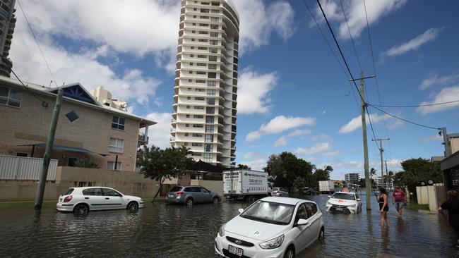 Flooding from the King tide at Budds Beach at Surfers Paradise was made worse by the approaching storm system. Picture Glenn Hampson