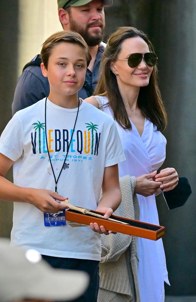 Jolie steps out at Universal Studios with her son Knox this week. Picture: CelebCandidly/Snorlax/MEGA