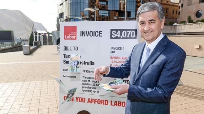 Treasurer Rob Lucas in an election stunt on Monday, with fake Labor ‘money’. Picture: NCA NewsWire / Brenton Edwards