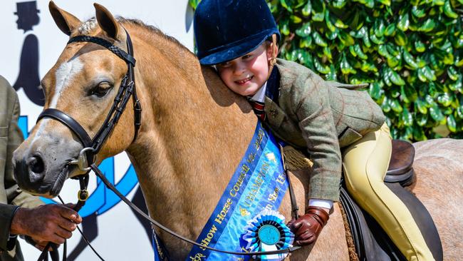 Winners’ embrace: Harry Armistead Riemer gives his pony Pant-y-Flynon Cariad a winning hug. Picture: Lisa Gordon