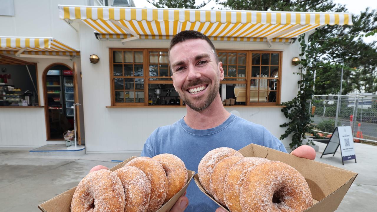 The Tallebudgera Boardwalk will be opening by the end of August. Neptune Kiosk is getting ready for the opening and Barista Nic Partridge is ready to give away plenty of doughnuts on the day to celebrate. Picture Glenn Hampson