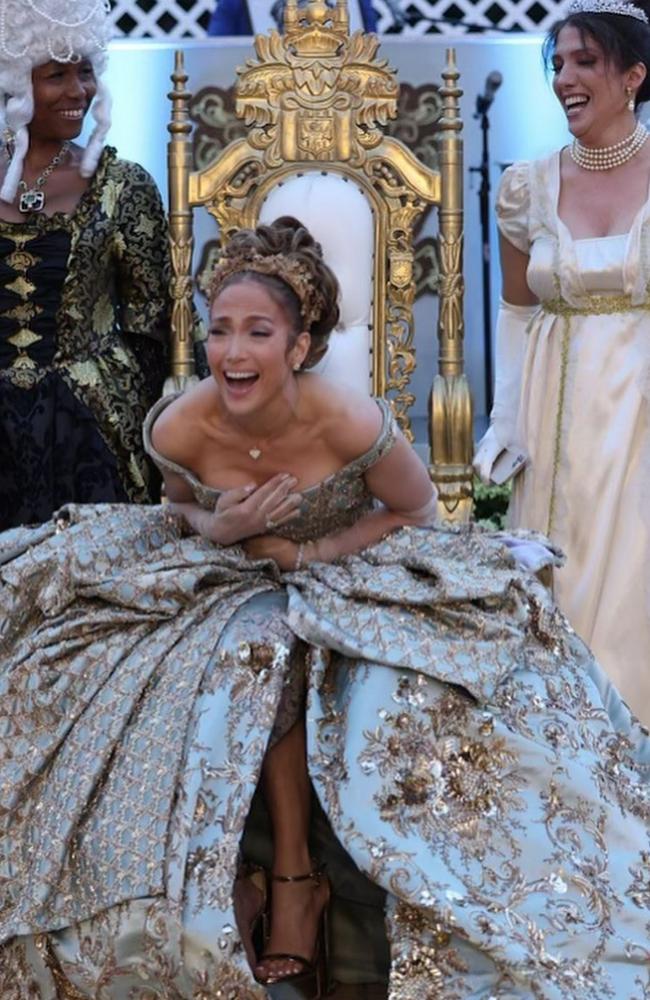 Jennifer Lopez laughs at her Bridgerton-themed birthday party, where she wore a custom-made gown by Manish Malhotra. Picture: manishmalhotra05 on Instagram