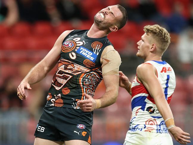 SYDNEY, AUSTRALIA - MAY 18: Kieren Briggs of the Giants reacts after a missed kick on goal during the round 10 AFL match between Greater Western Sydney Giants and Western Bulldogs at ENGIE Stadium, on May 18, 2024, in Sydney, Australia. (Photo by Cameron Spencer/Getty Images)