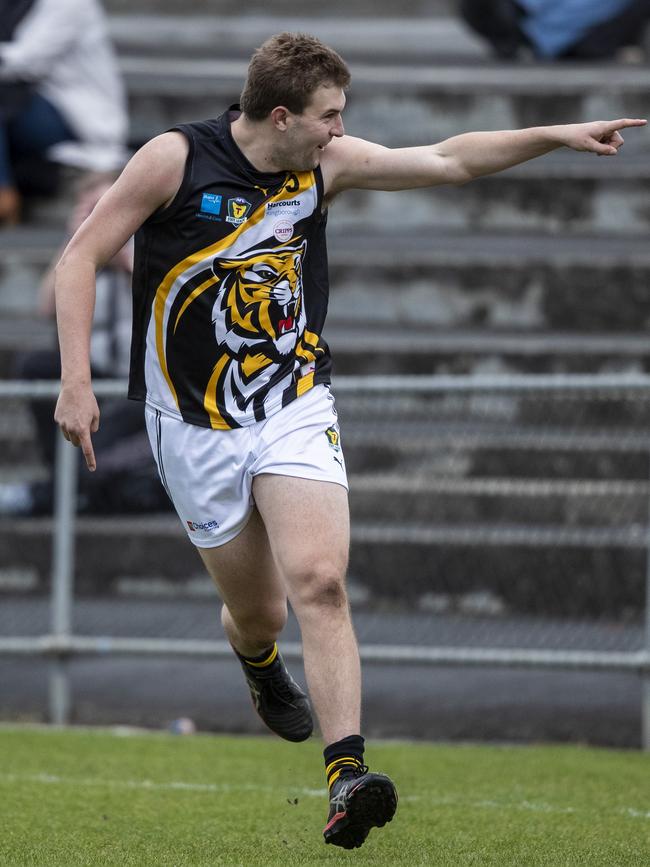 Shortly after booting his seventh goal against North Hobart, Tyler Carter badly dislocated his ankle. Picture: LUKE BOWDEN