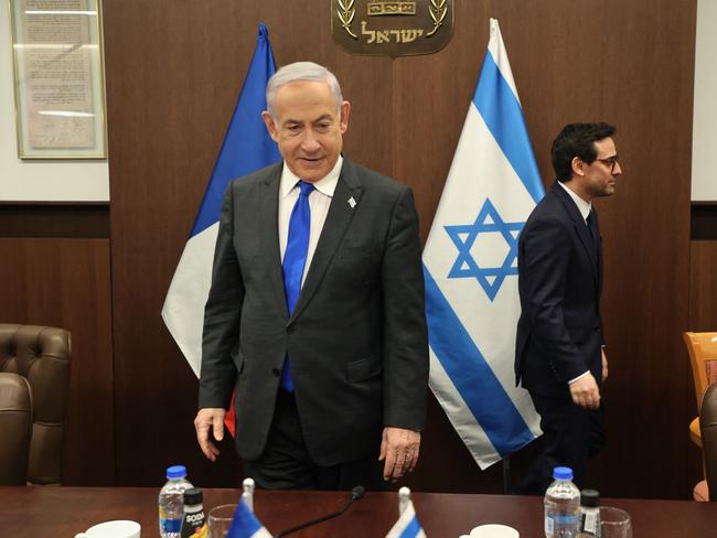 Israeli Prime Minister Benjamin Netanyahu and France’s Foreign Minister Stephane Sejourne take their seats before their meeting in Jerusalem. Picture: AFP