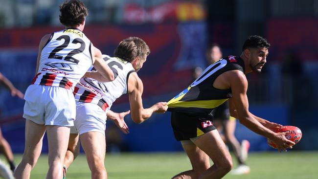 Richmond premiership player Marlion Pickett has continued to play at the highest level despite accusations of being involved in burglaries. Picture: Mark Brake/Getty Images.