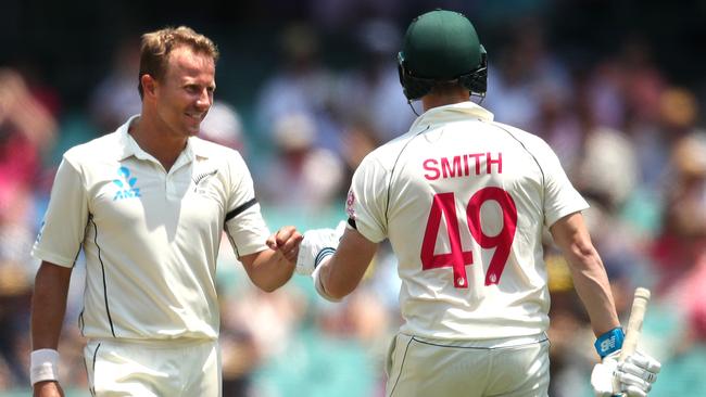 Neil Wagner and Steve Smith’s playful fist bump after Smith finally got off the mark. Picture. Phil Hillyard