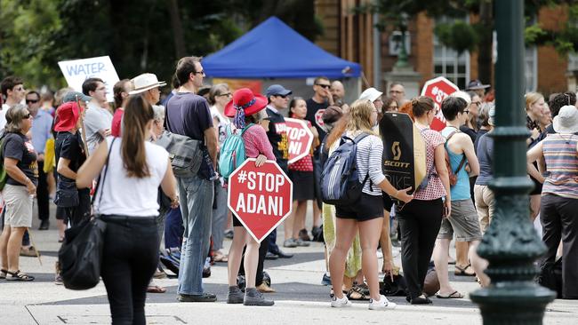 Protesters gathered outside Parliament House today. Picture: AAP/Josh Woning