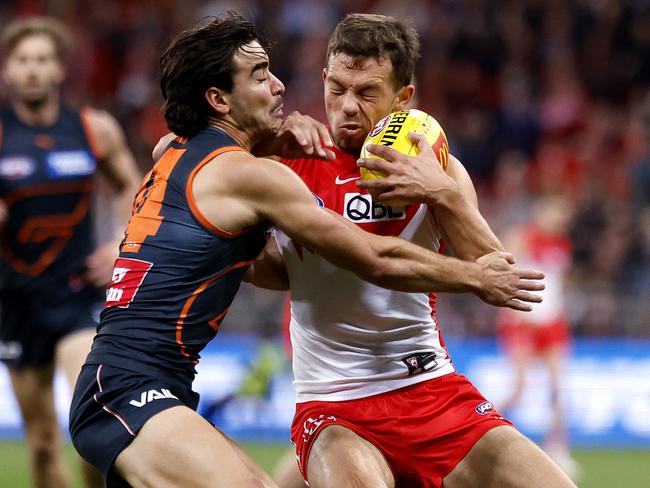 Giants Toby Bedford tackles Sydney's Oliver Florent during the Sydney Derby XXVI AFL match between the GWS Giants and Sydney Swans  at Giants Stadium on August 5, 2023. Photo by Phil Hillyard(Image Supplied for Editorial Use only - **NO ON SALES** - Â©Phil Hillyard )