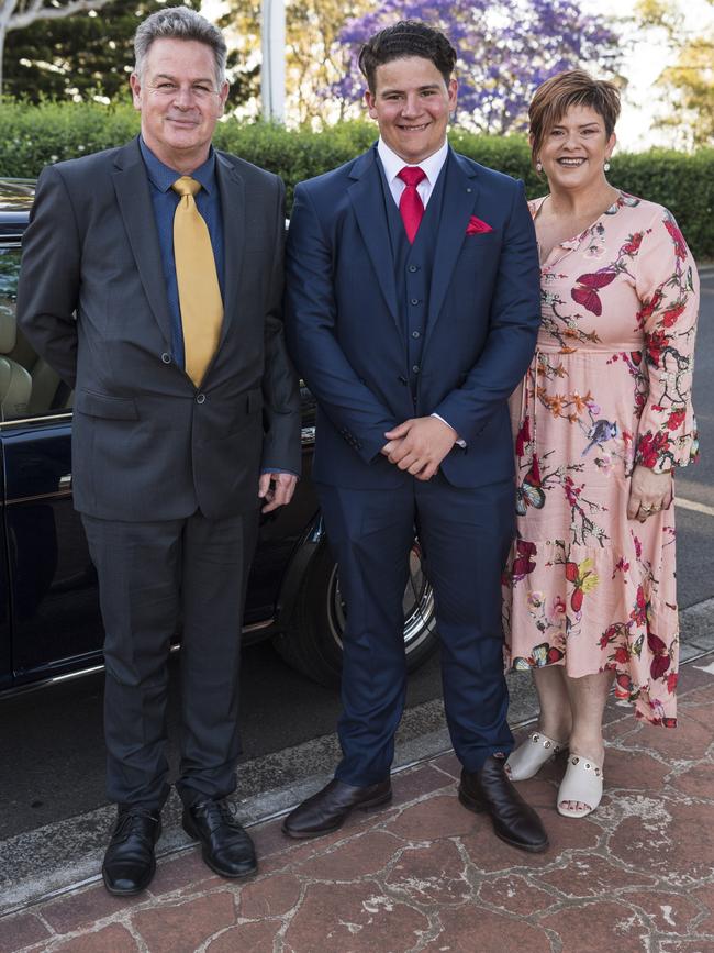 Graduate Lachlan Sharpe with parents Scott and Wendy Sharpe at Centenary Heights State High School formal at Picnic Point, Friday, November 20, 2020. Picture: Kevin Farmer