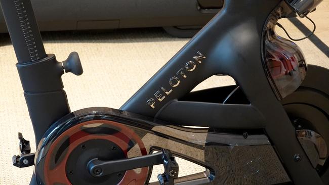 Lately, it seems like Peloton is throwing a lot of ideas at the wall and seeing what – if anything – sticks. Above, a Peloton bike on a showroom floor. Picture: Getty Images / AFP