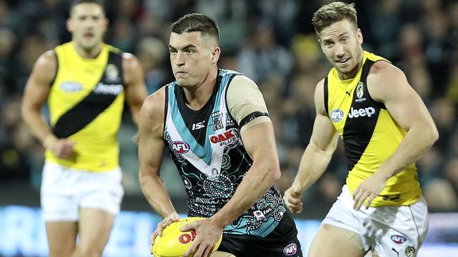 Tom Rockliff on the burst during the win against Richmond last year. Picture Sarah Reed