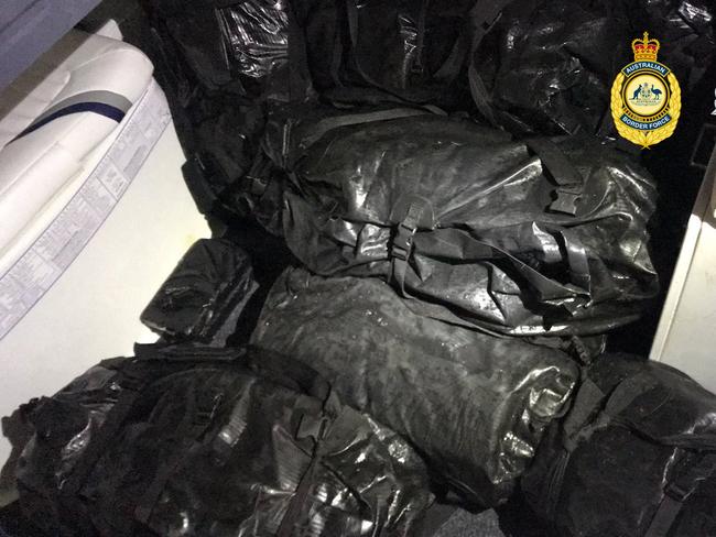 Two Mackay men have been extradited to WA over attempted drug importation allegations after AFP officers found 560kg of cocaine at a Kalbarri property, about 570km northwest of Perth. Pictures: AFP