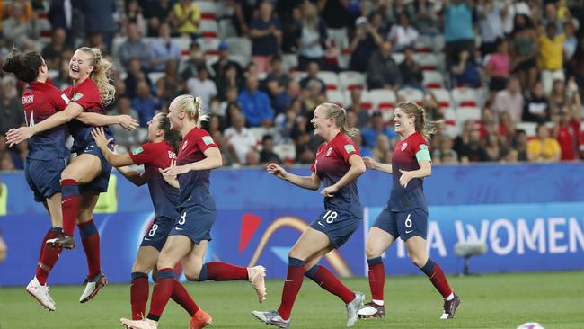 Norway players celebrate after winning the penalty shootout.