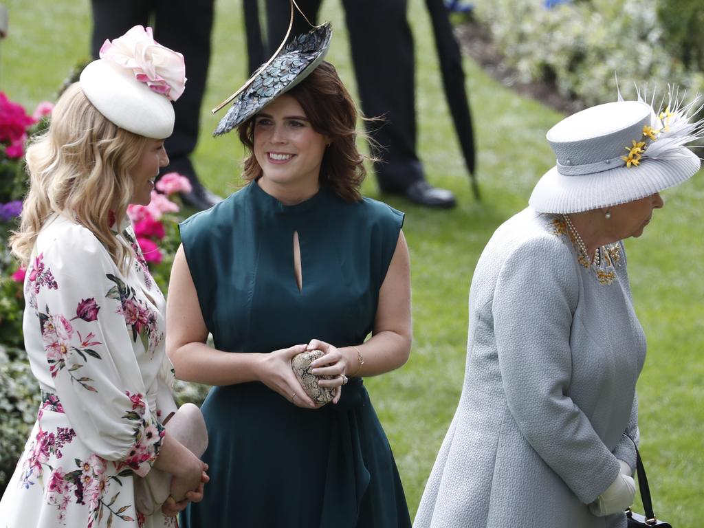 Princess Eugenie with Autumn Phillps and the Queen. Picture: AP