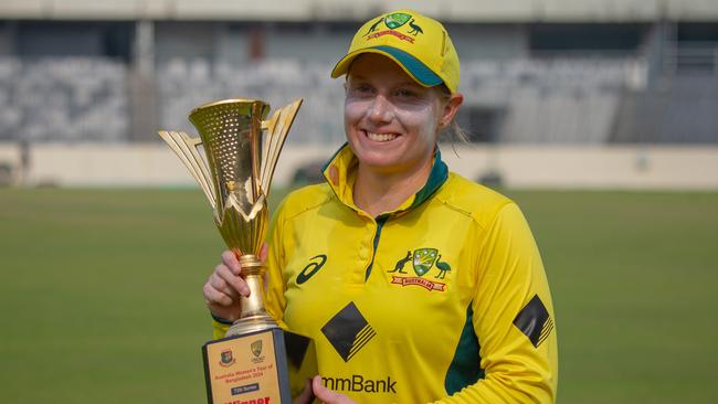 DHAKA, BANGLADESH - APRIL 04: Alyssa Healy of Australia poses with the winner's trophy  game three of the Women's T20 International series between Bangladesh and Australia at Sher-e-Bangla National Cricket Stadium on April 04, 2024 in Dhaka, Bangladesh. (Photo by Abhishek Chinnappa/Getty Images)