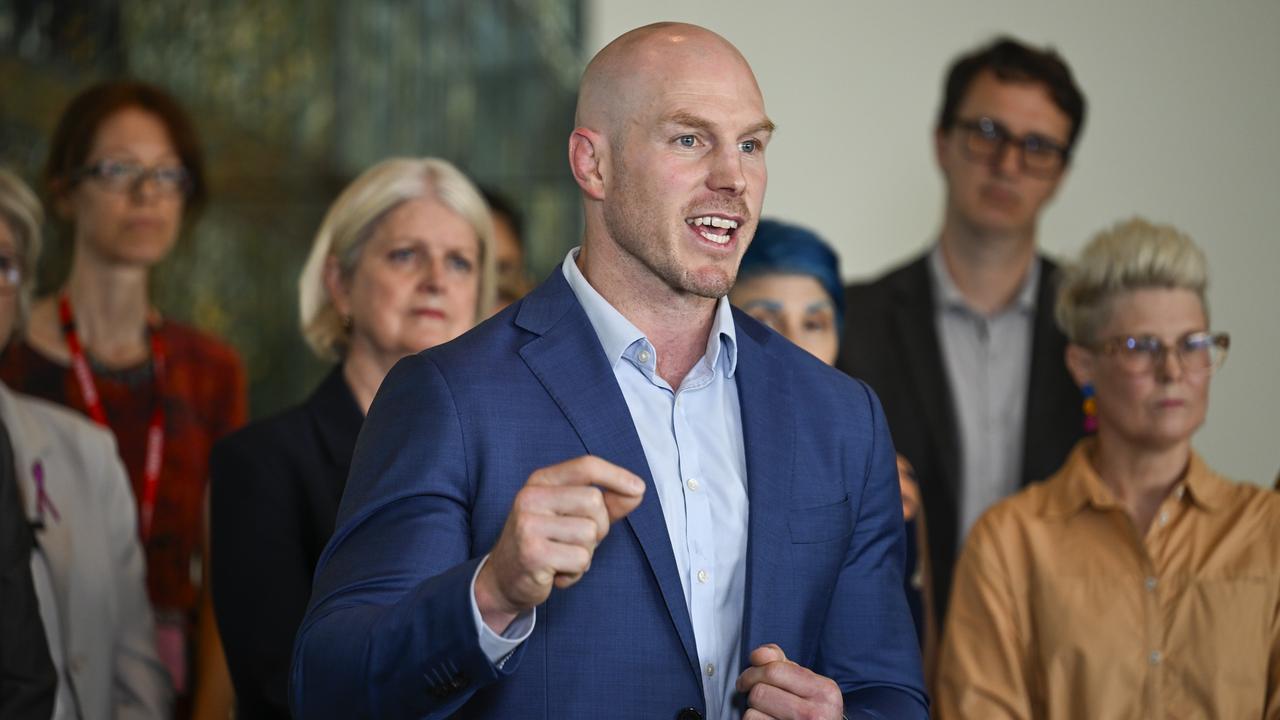 David Pocock with crossbench MPs and community sector leaders during a press call about cost of living in February. Picture: NewsWire/Martin Ollman